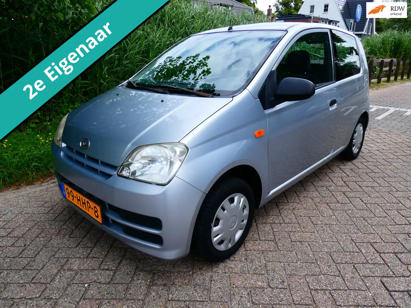 Daihatsu Cuore 1.0-12V 2e eig. 64.000km. Stuurbekr. Zuinig Nette Grau - 1