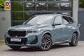 BMW X1 sDrive18i | M Sport | Carplay | Camera | Fabrieksg Groen - thumbnail 1