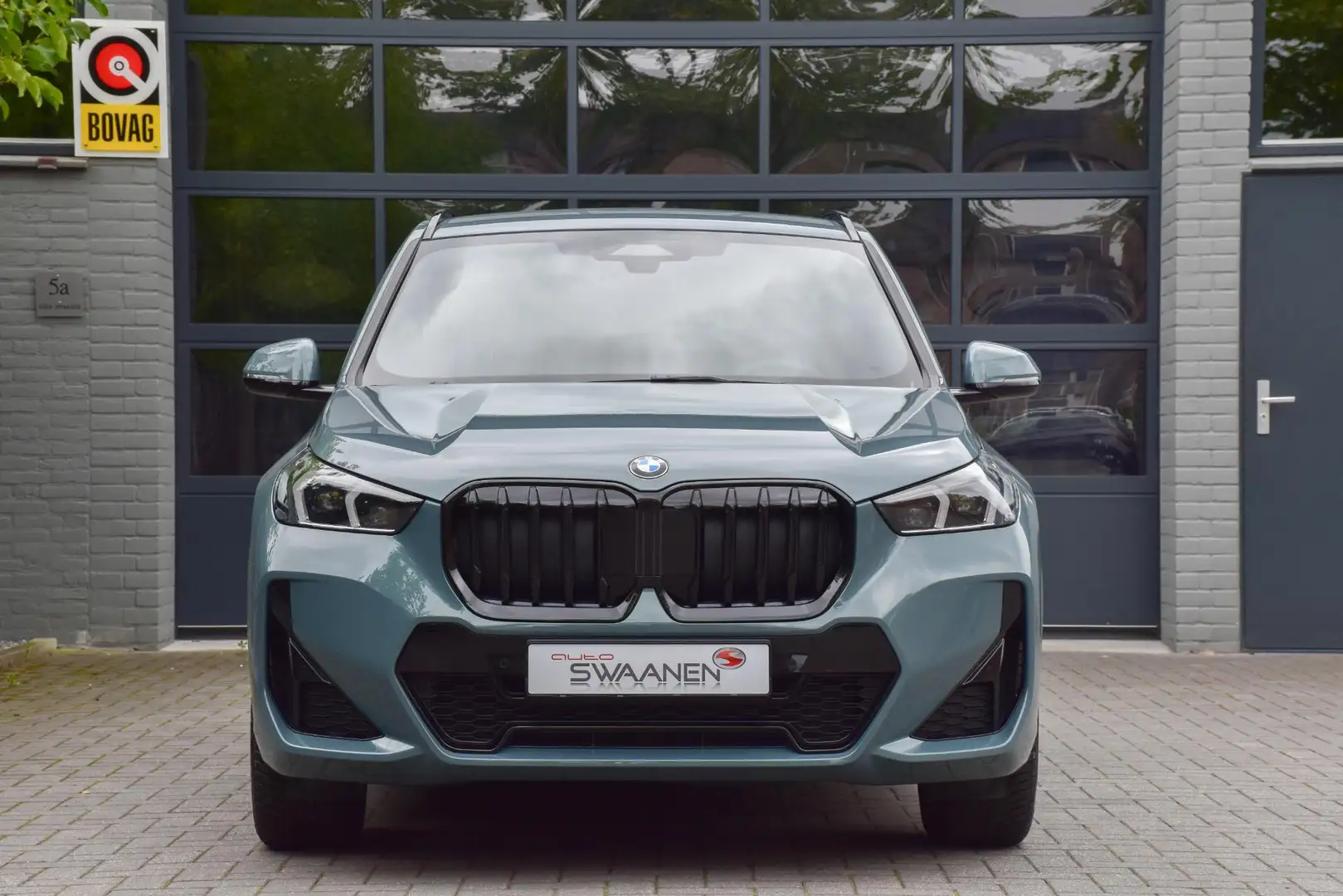 BMW X1 sDrive18i | M Sport | Carplay | Camera | Fabrieksg Groen - 2