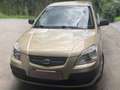 Kia Rio Rio 1,4i Motion "Pilot" "Motion ""Pilot"" " Gold - thumbnail 1