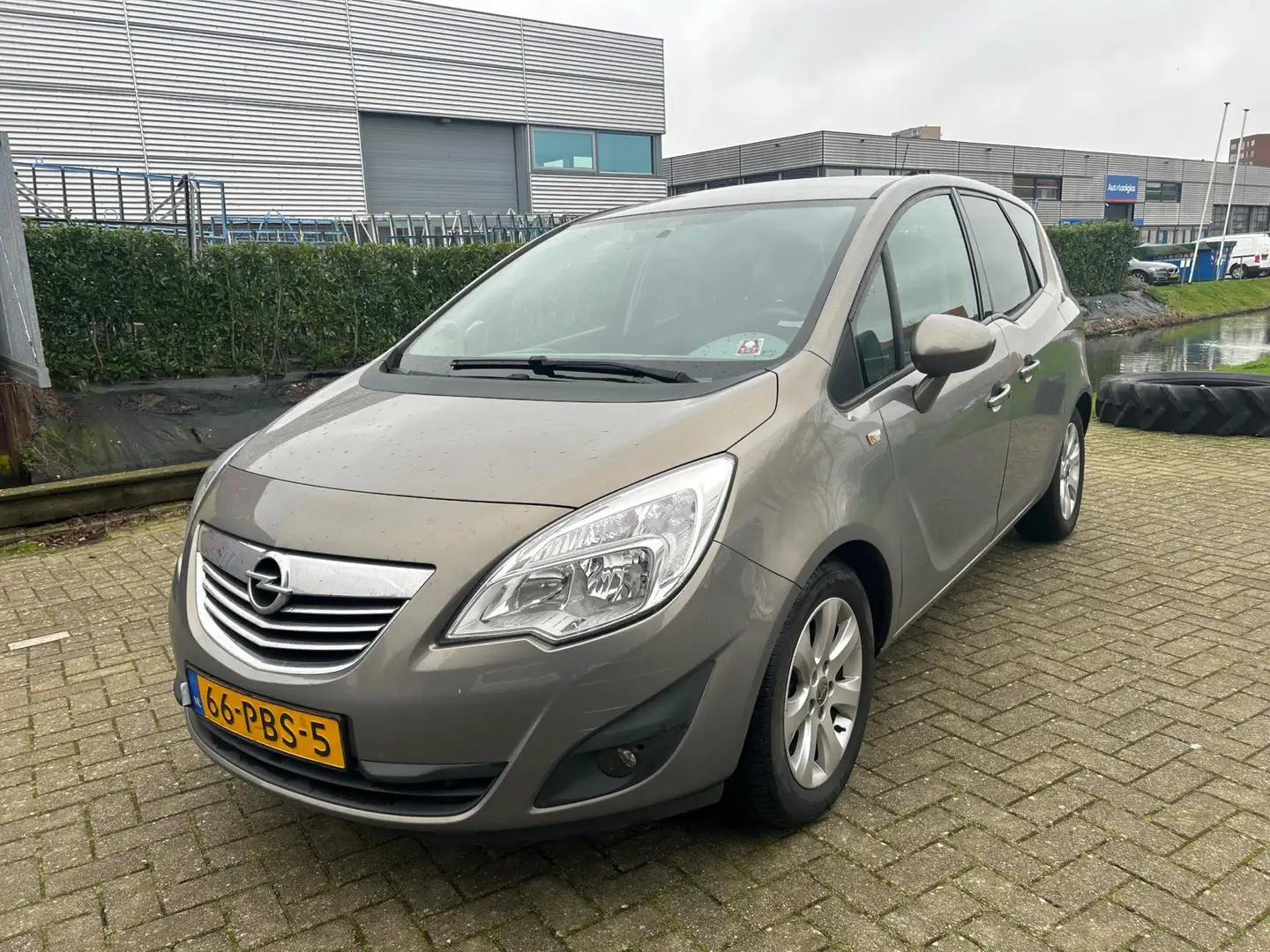Opel Meriva 1.3 CDTi Cosmo Clima Cruise APK NAP Bruin - 1