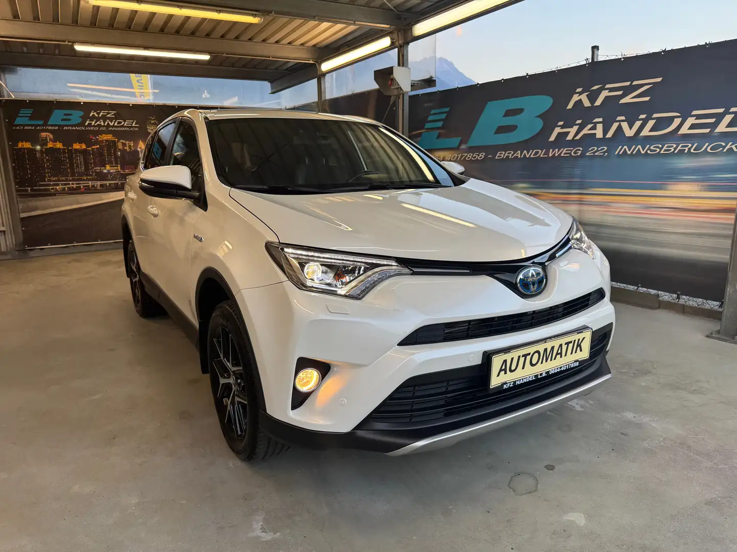 Toyota RAV 4 RAV4 2,5 Hybrid Lounge 2WD Aut. Weiß - 1