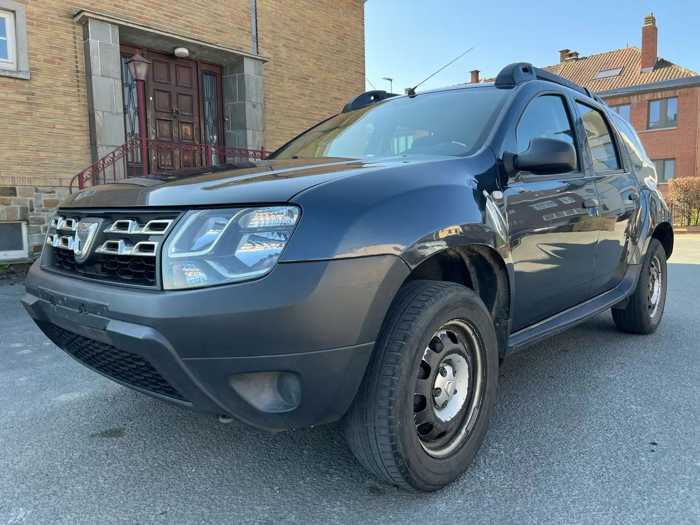 Dacia Duster 1.6i Gris - 1