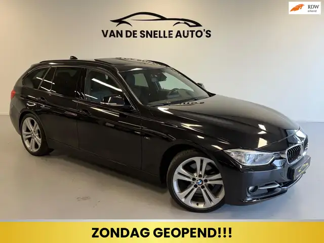 BMW 330 3-serie Touring 330d High Executive PANO/H&K/HUD/S