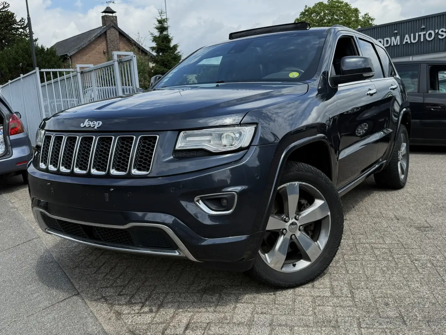 Jeep Grand Cherokee 3.0 CRD LIMITED NAVI/XENON/PANO/LEER/MEMORY B Blauw - 1