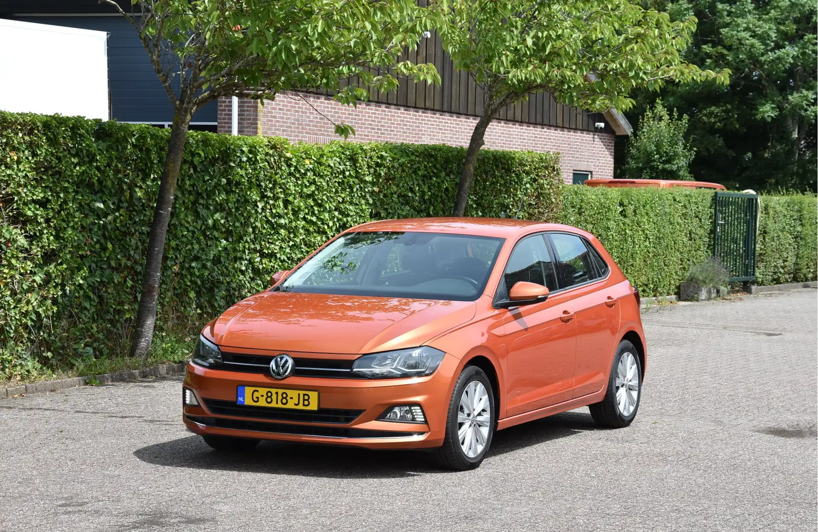 Volkswagen Polo 96 PK TSI Highline Navi ECC NAP Nieuwstaat! 1e eig Oranje - 1