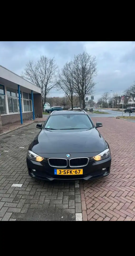 BMW 318 318d Touring Aut. Luxury Line Zwart - 1