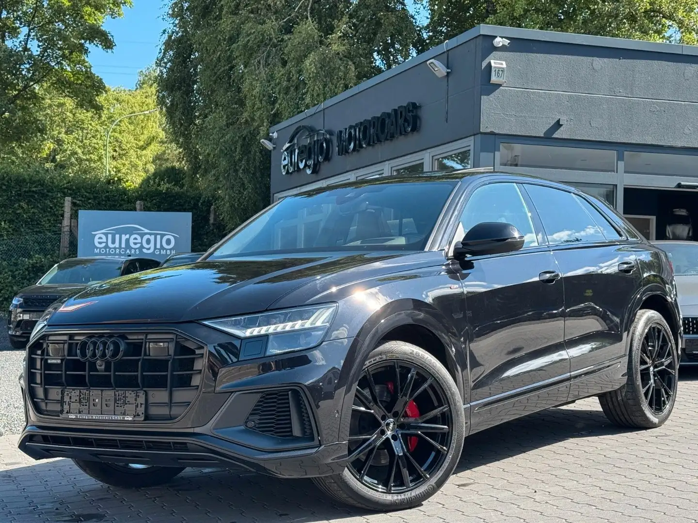 Audi Q8 50 TDI quattro Aut. 1 Hand - S line /// Zwart - 1