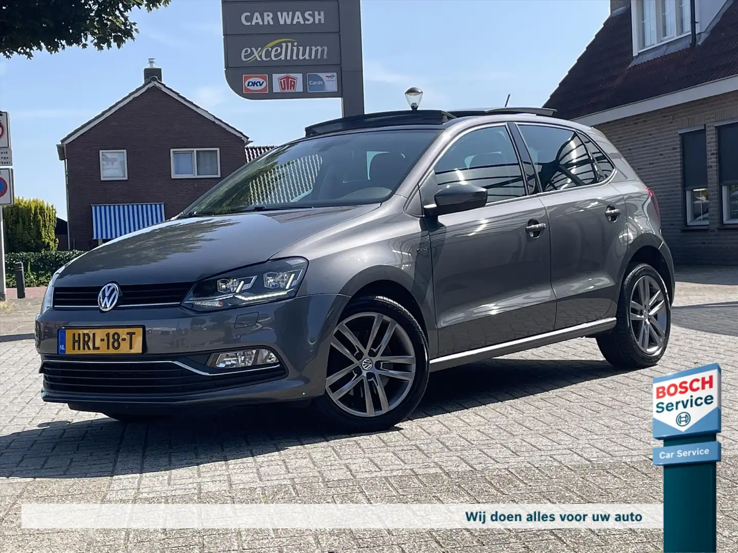 Volkswagen Polo 1.2 TSI Lounche 110PK / Pano / Led / Carplay / Sto Grigio - 1