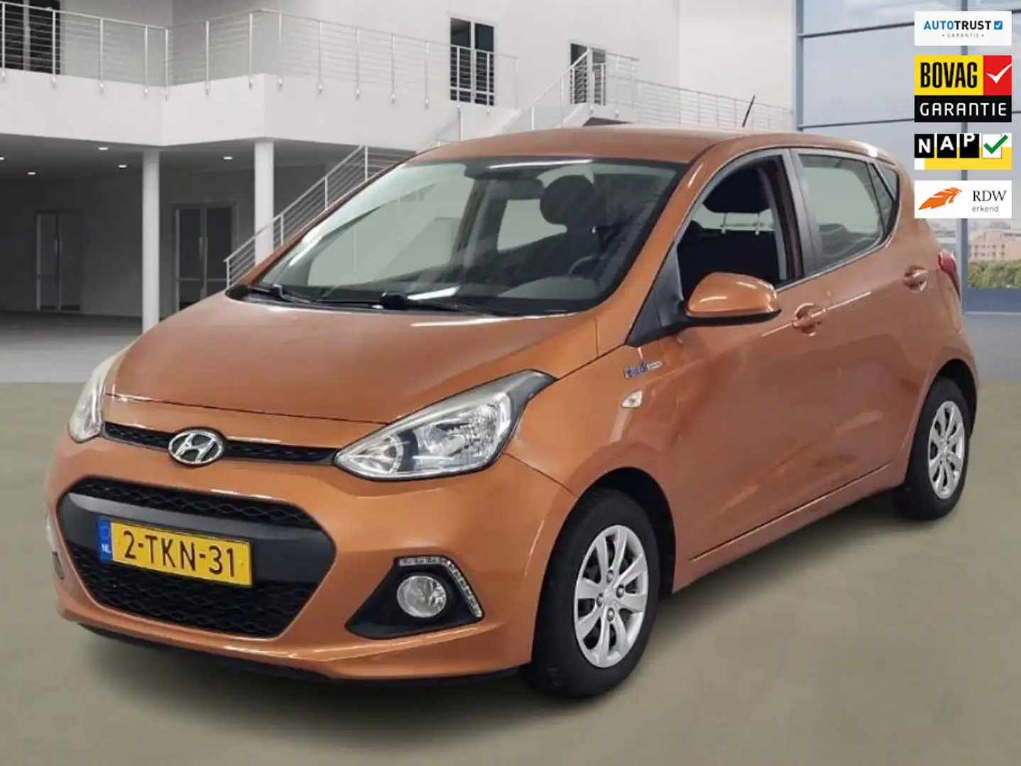 Hyundai i10 1.0i i-Motion Comfort Plus 1e Eig. 68.500 km +NAP Oranje - 1