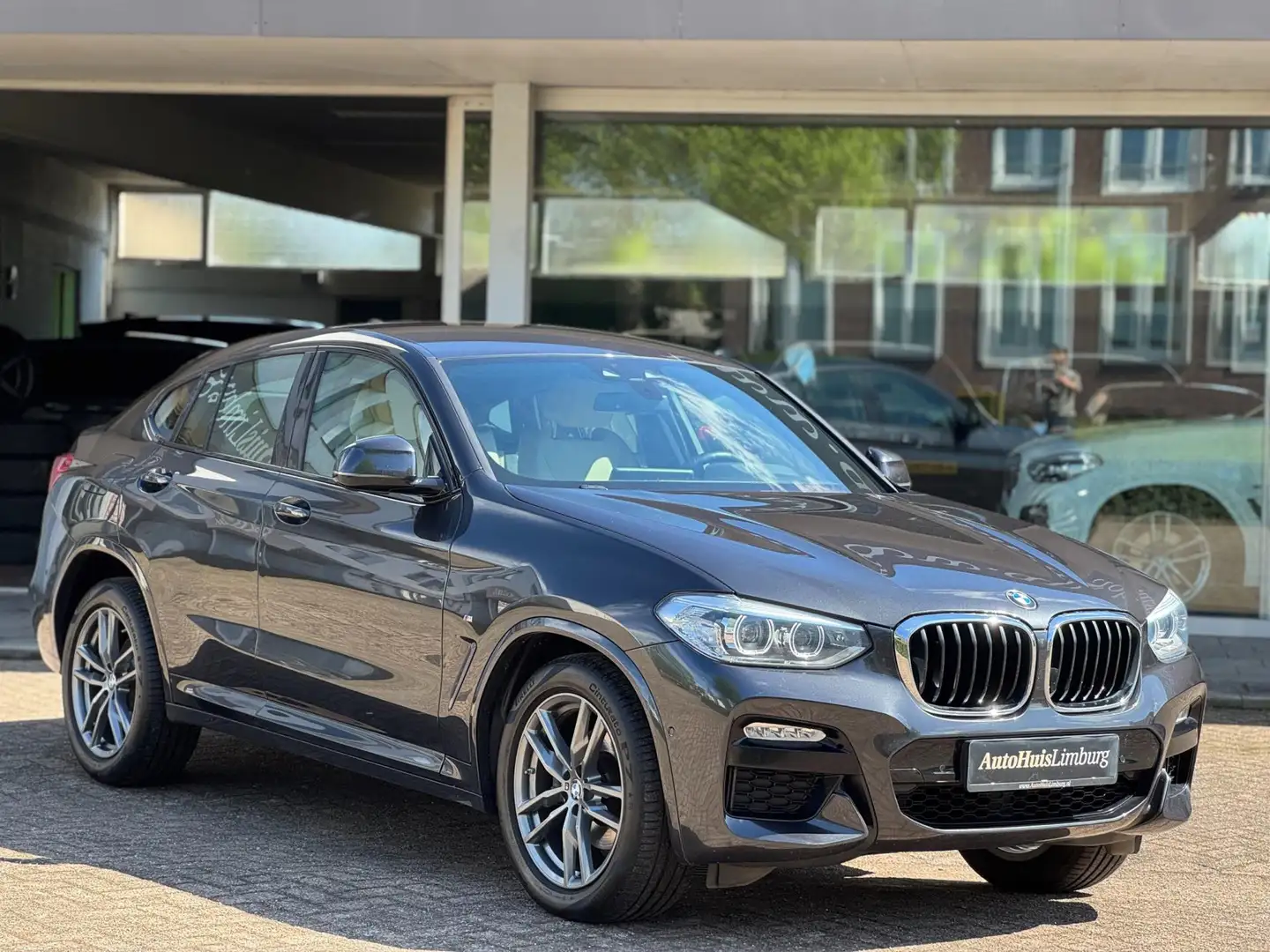 BMW X4 XDrive20i High Executive Edition|Camera|M Sport pa Grijs - 1