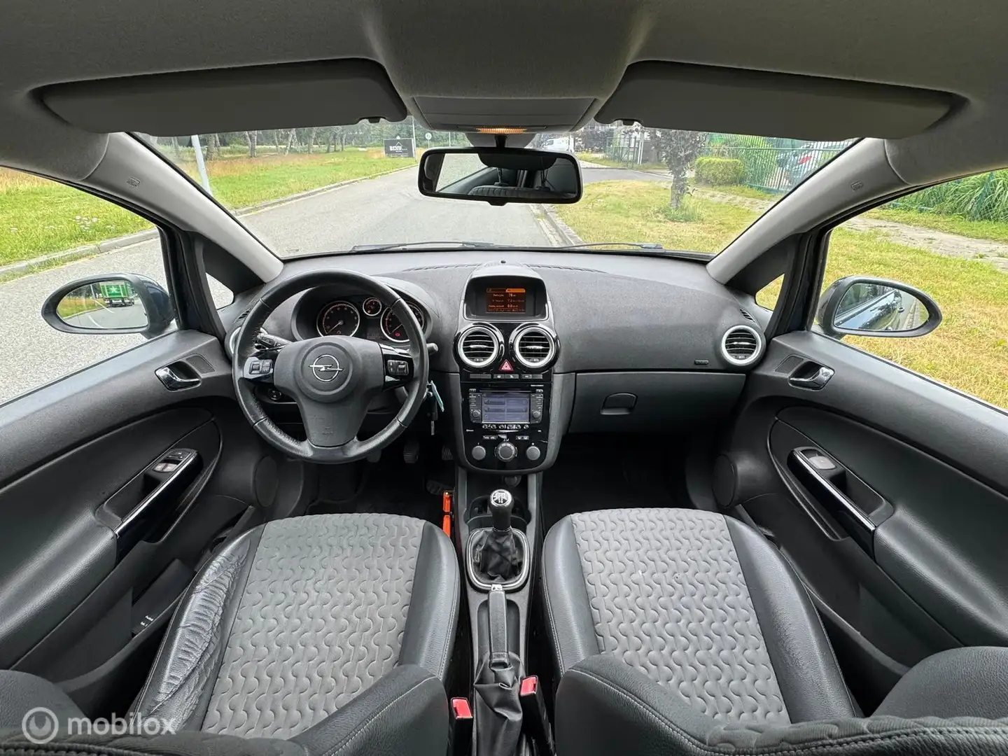 Opel Corsa 1.4-16V Cosmo 5Drs Airco Navi Blauw - 2