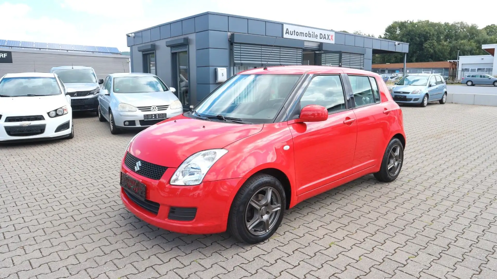 Suzuki Swift Lim. 1.3 16V*Nur 89.325 KM*1-Hand* Rot - 1
