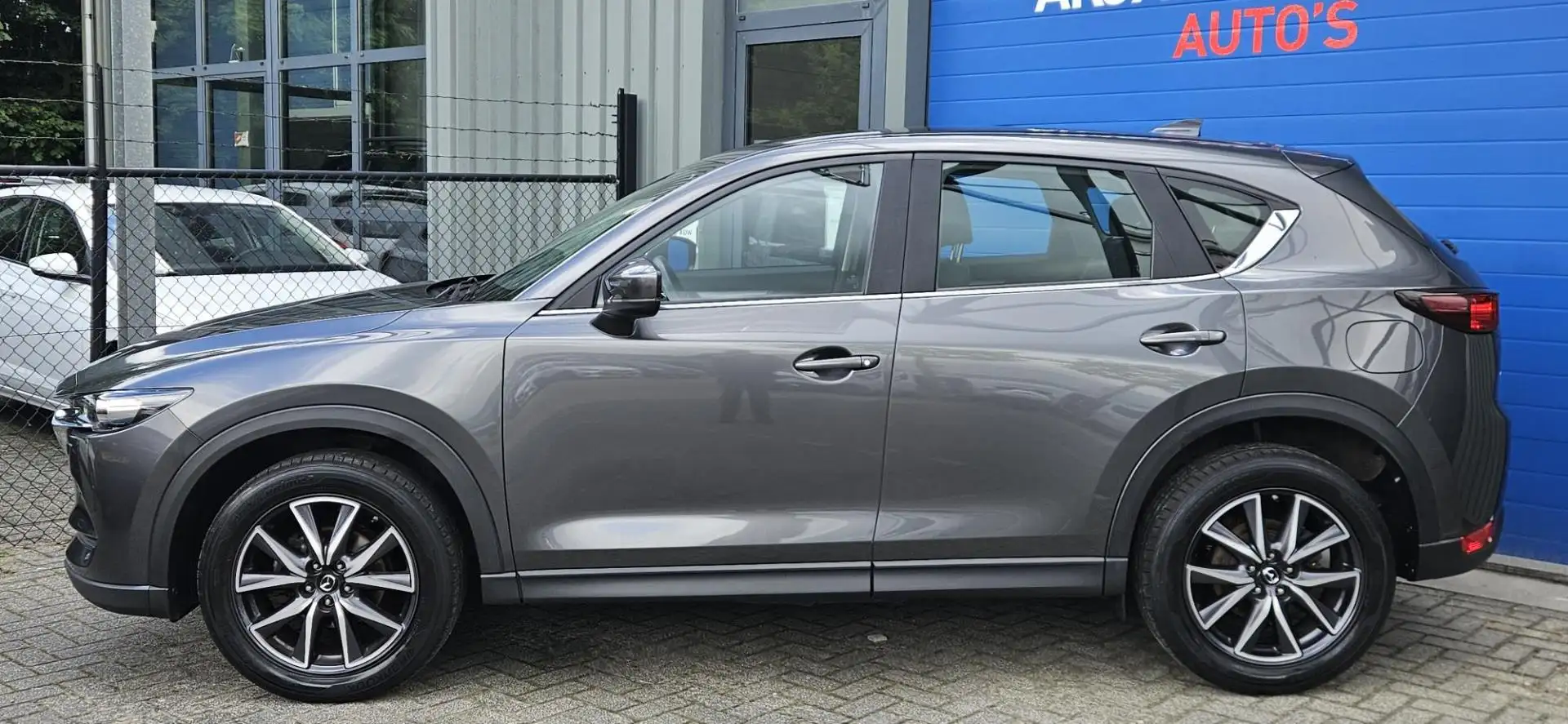 Mazda CX-5 2.0 SkyActiv-G 165PK Airco Cruise LED 1800KG Trekg Gris - 2
