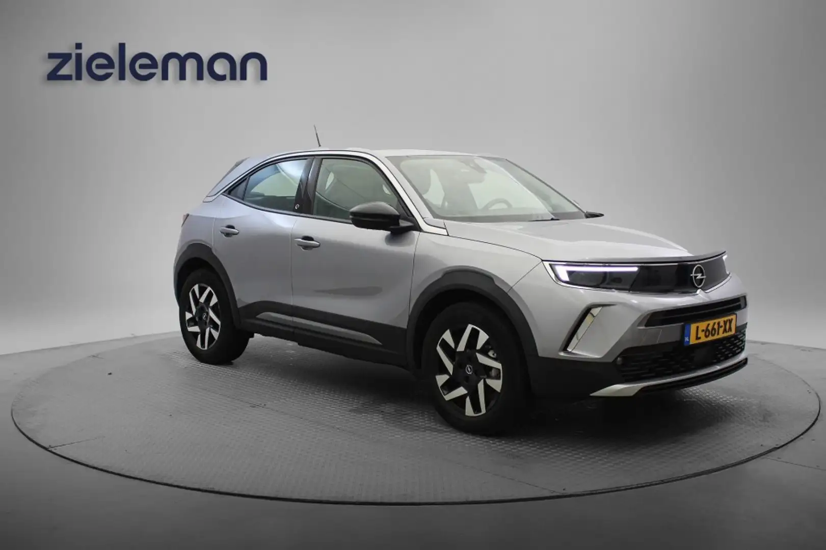 Opel Mokka-E Elegance 50-kWh 11kw - Carplay, Navi, Camera, Clim Grijs - 1