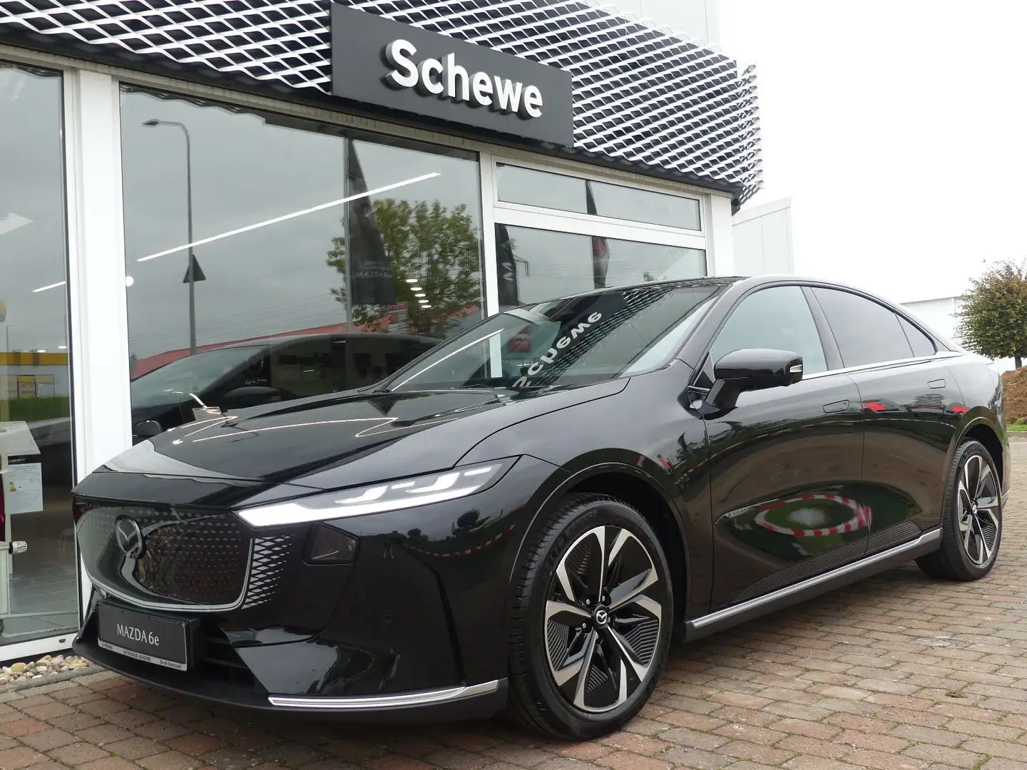 Mazda 6e EV Takumi Schwarz - 1
