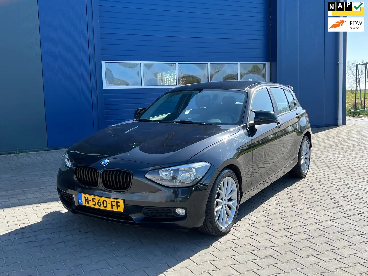 BMW 114 1-serie 114i EDE Executive | Cruise + Airco Zwart - 1