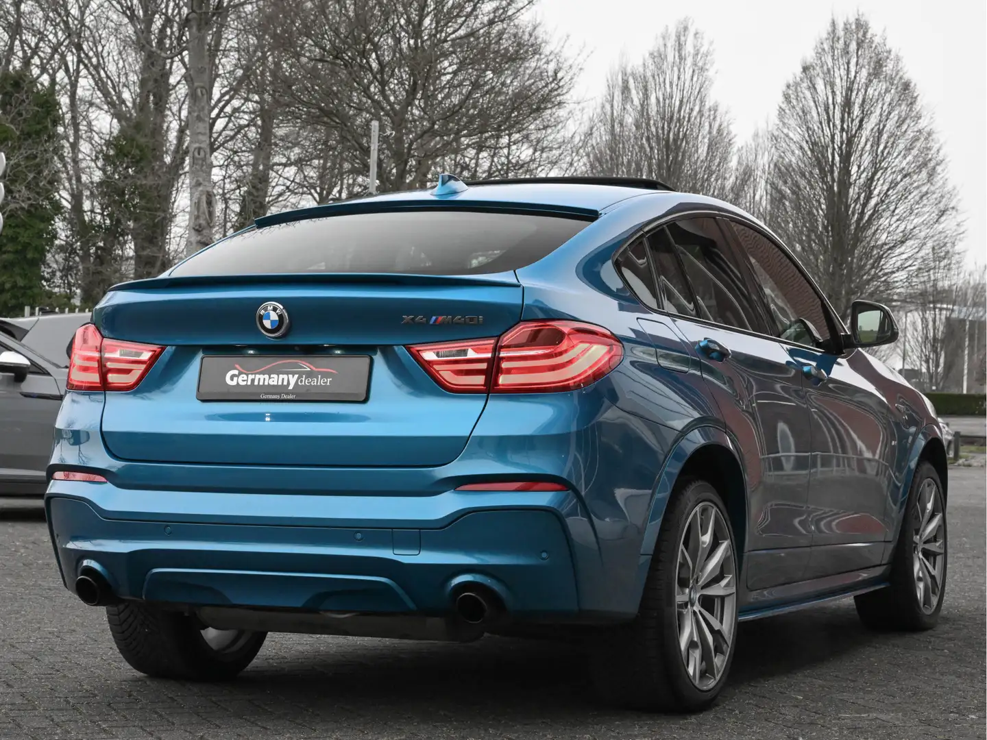 BMW X4 M40i 361pk M-Sport High Executive Schuifdak Tr-Haa Blauw - 2