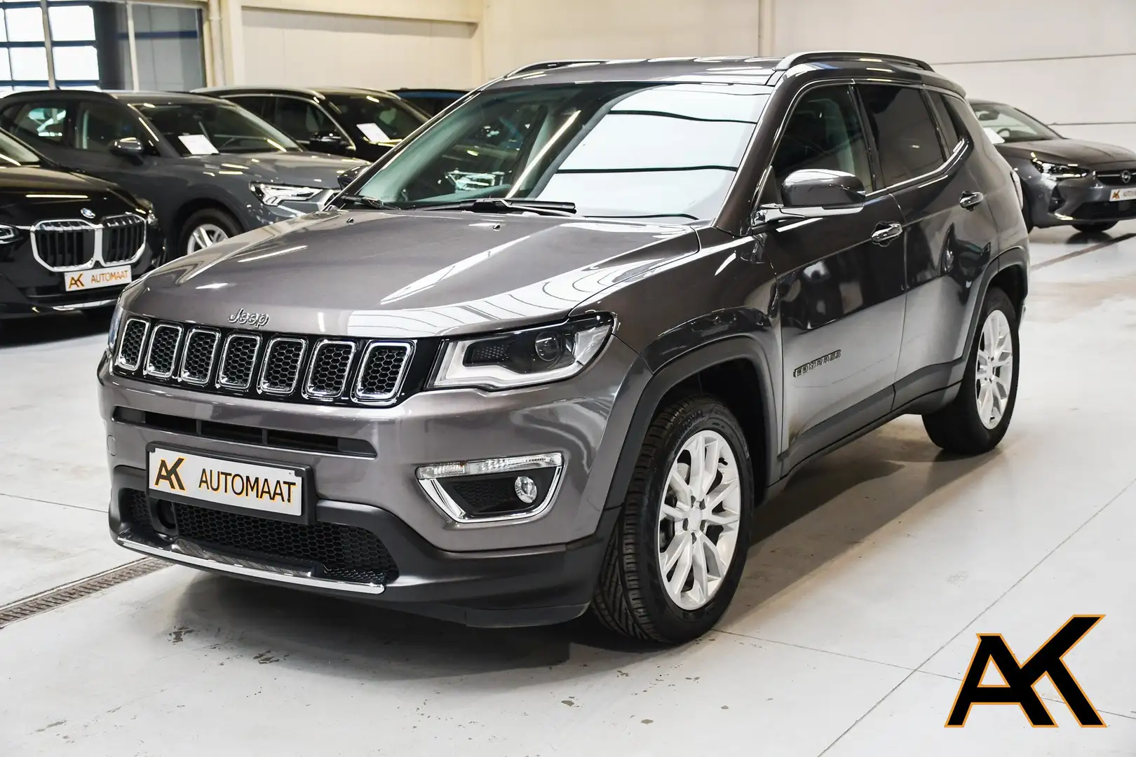 Jeep Compass 1.3 Turbo 4x2 Limited Automaat - NAVI / TREKHAAK Gris - 1