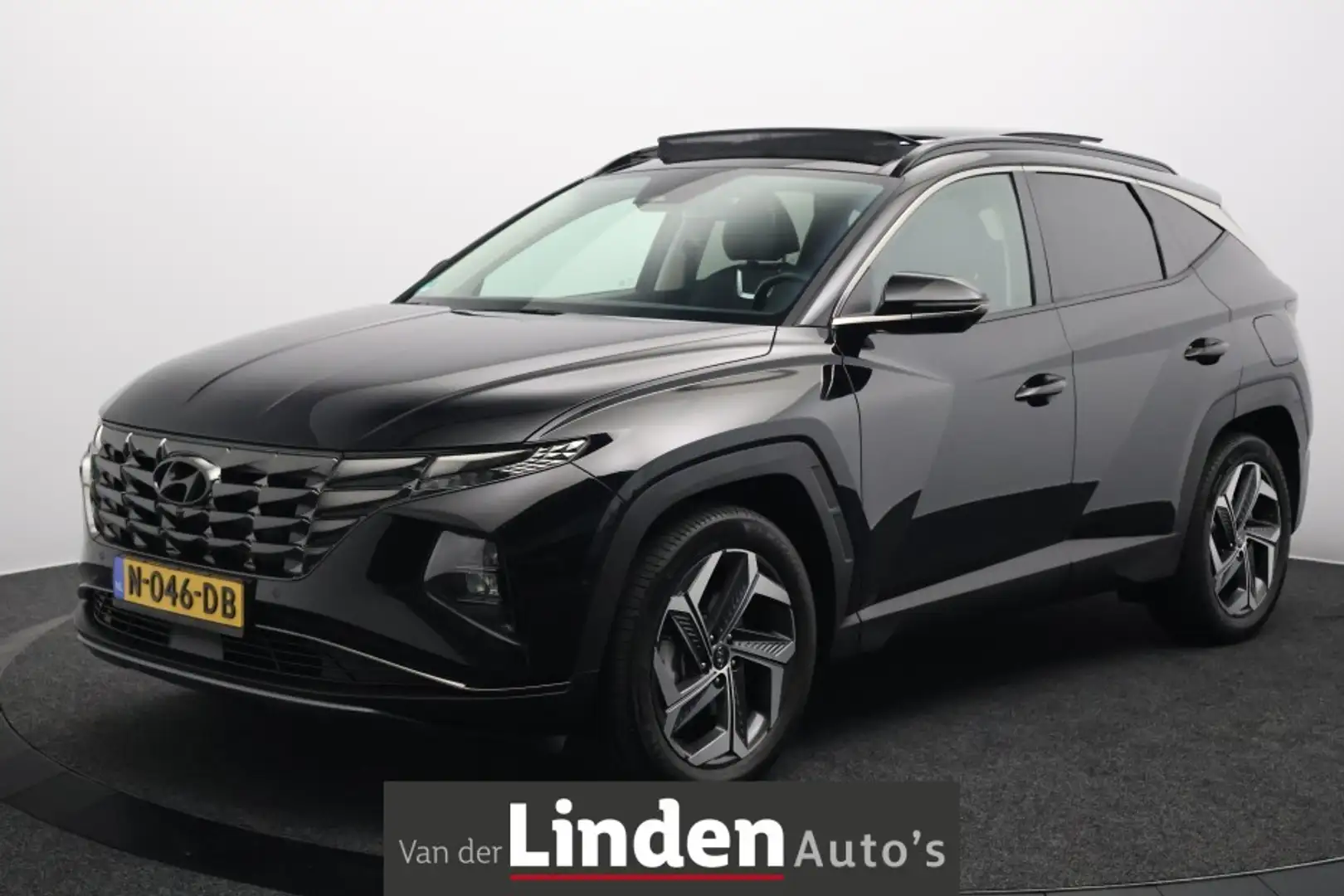 Hyundai TUCSON 1.6 T-GDI HEV Premium Sky | Panoramadak | Trekhaak Zwart - 1