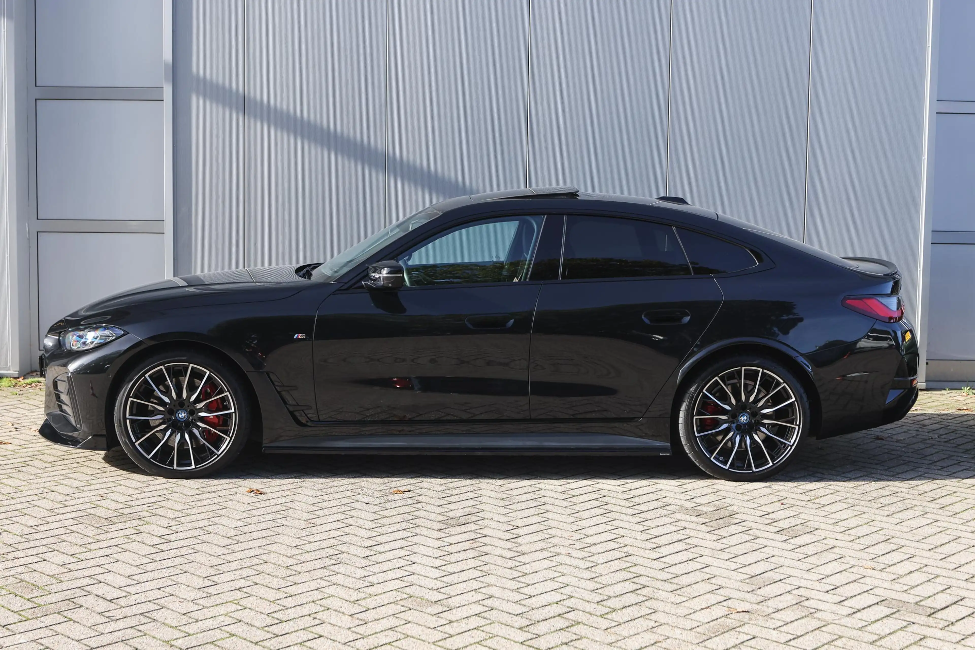BMW i4 M50 / Schuif-kanteldak / Laserlight / Parking Assi — photo 9