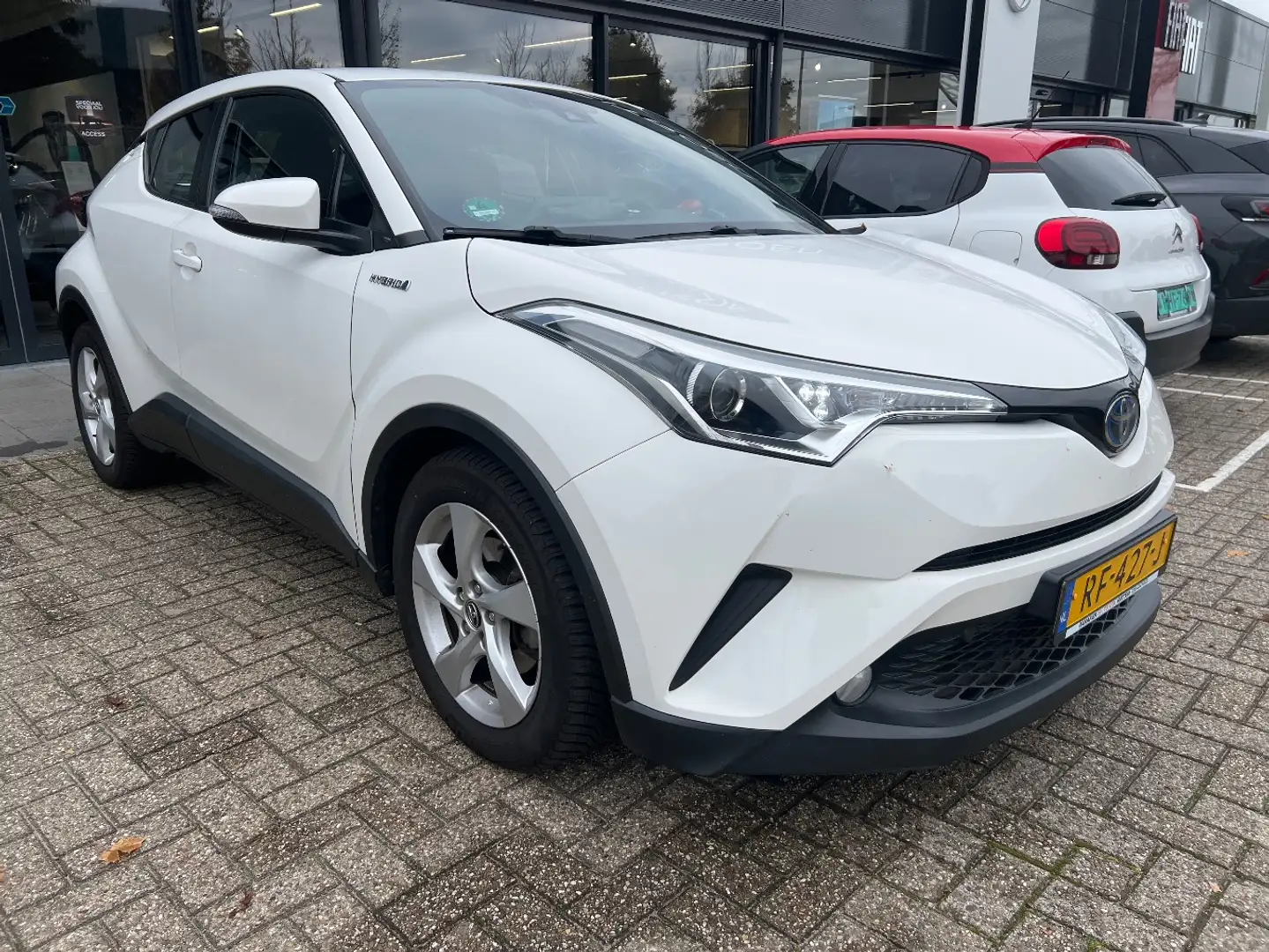 Toyota C-HR 1.8 Hybrid Active | Achteruitrijcamera | Airco (au Wit - 2