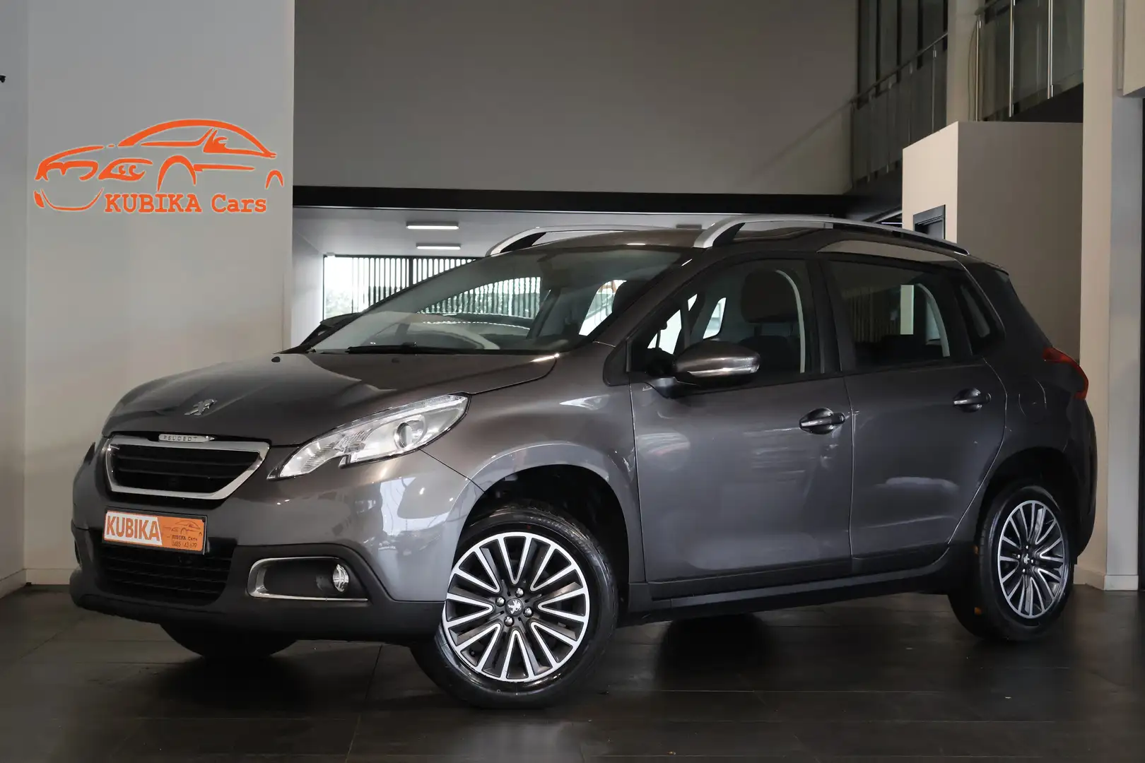 Peugeot 2008 1.2 PureTech Navi CruiseC Airco ParkeerS Garantie* Grigio - 1