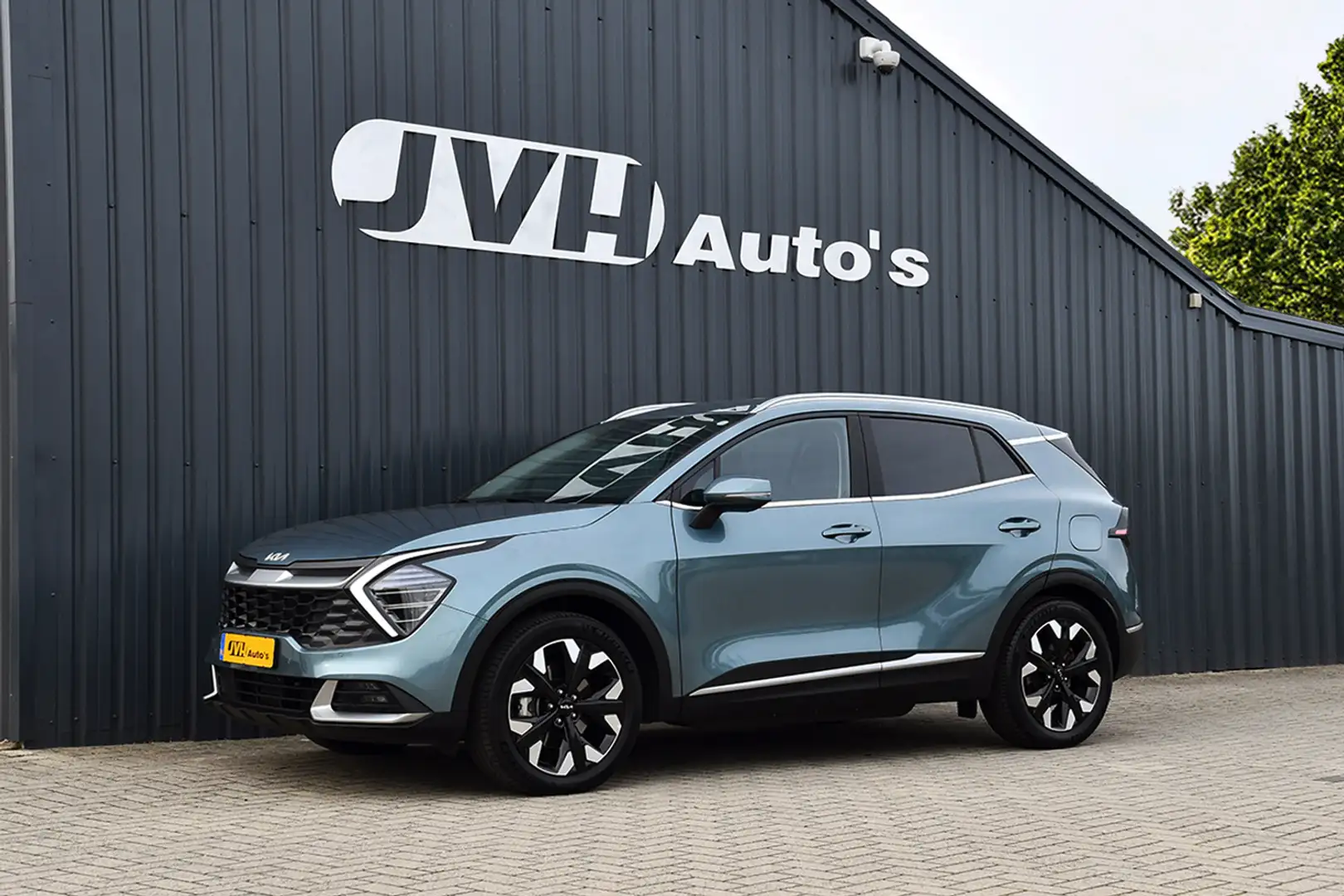 Kia Sportage 1.6 T-GDi PHEV Plug-In 265pk AWD 07-2023 | 1/2Lede Groen - 1