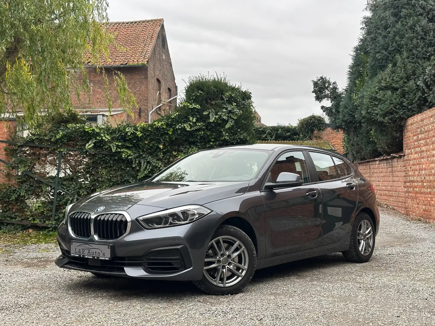 BMW 116 i Aut  Navi-Bluetooth-CruiseControl-PDC Grijs - 1