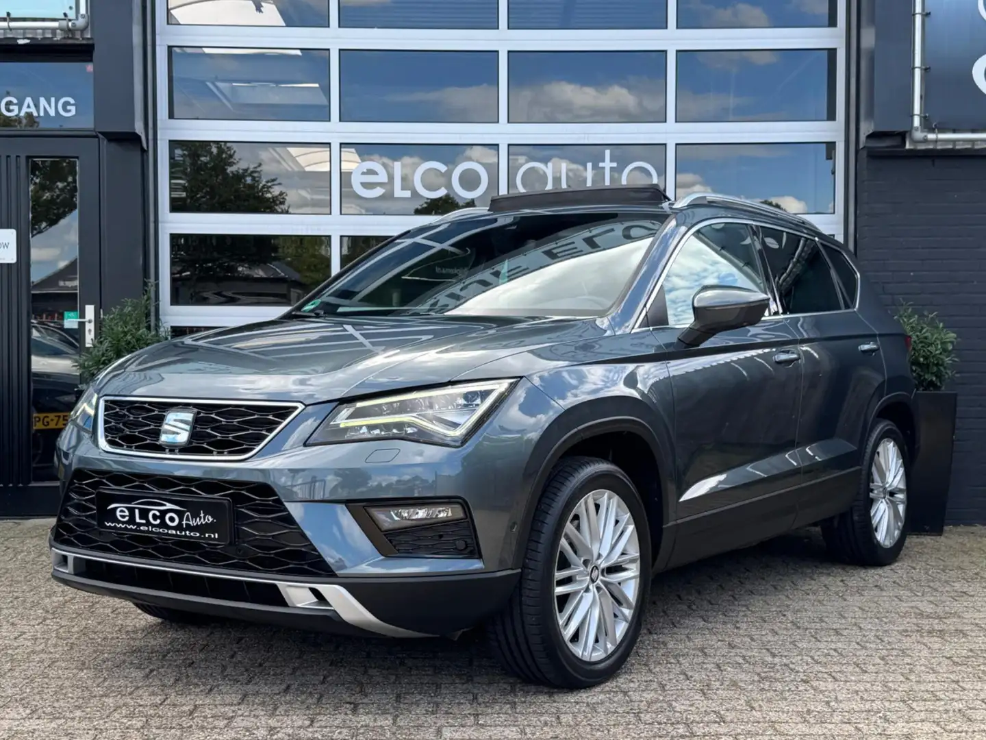 SEAT Ateca 1.5 TSI 4DRIVE Xcellence Business/ Pano / Trekhaak Grijs - 1