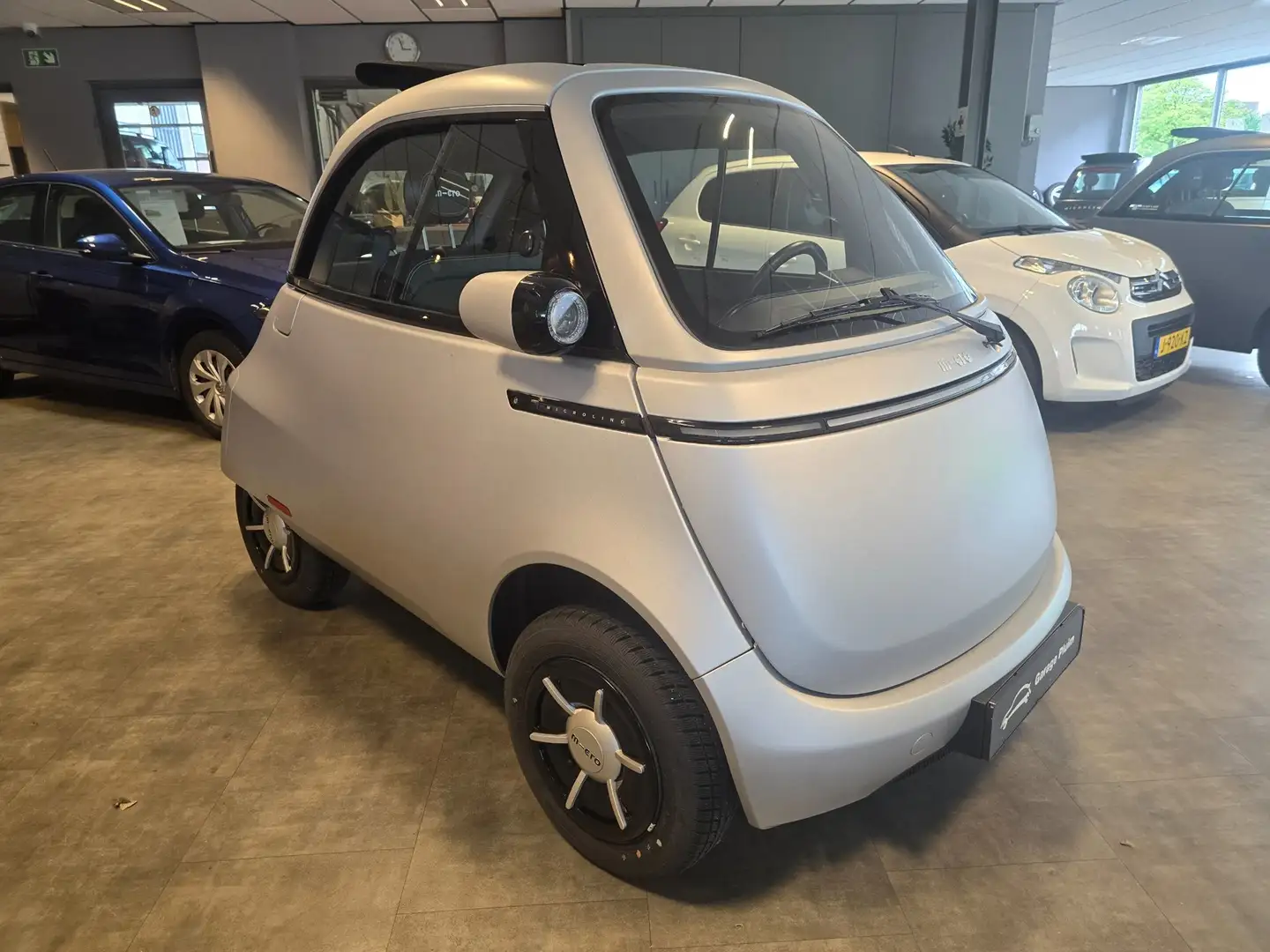 Micro Microlino Microlino Competizione 10.5 kWh L7 177 Km. 90Km/u Grau - 2
