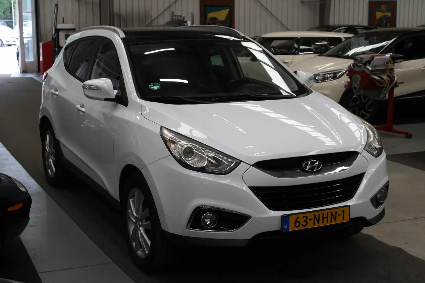 Hyundai iX35 2.0i i-Catcher Panoramadak, NAP, Airco, Navi, Stoe Wit - 2