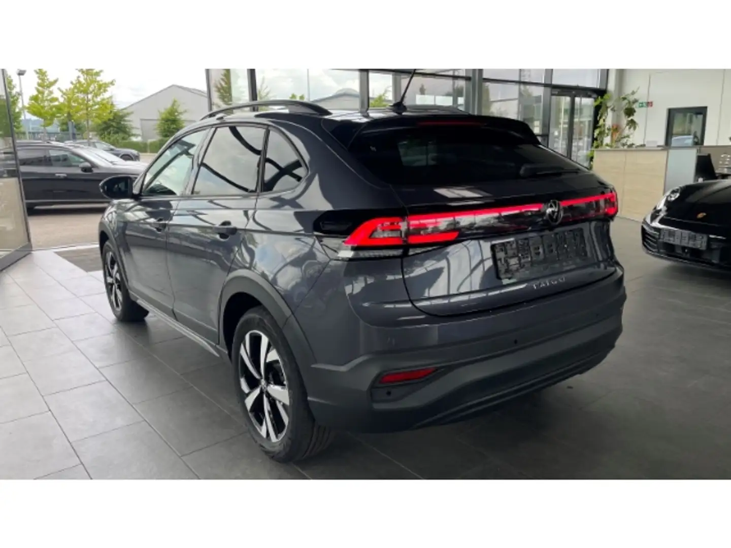 Volkswagen Taigo Style 1.0 TSI LED AHK Kamera ACC SitzHZG APP Conne Grau - 2