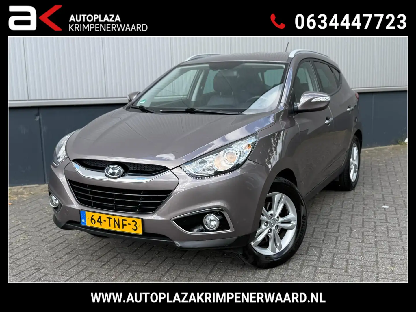 Hyundai iX35 2.0i Style Automaat Navi Airco Cruise Camera Trekh Brun - 1