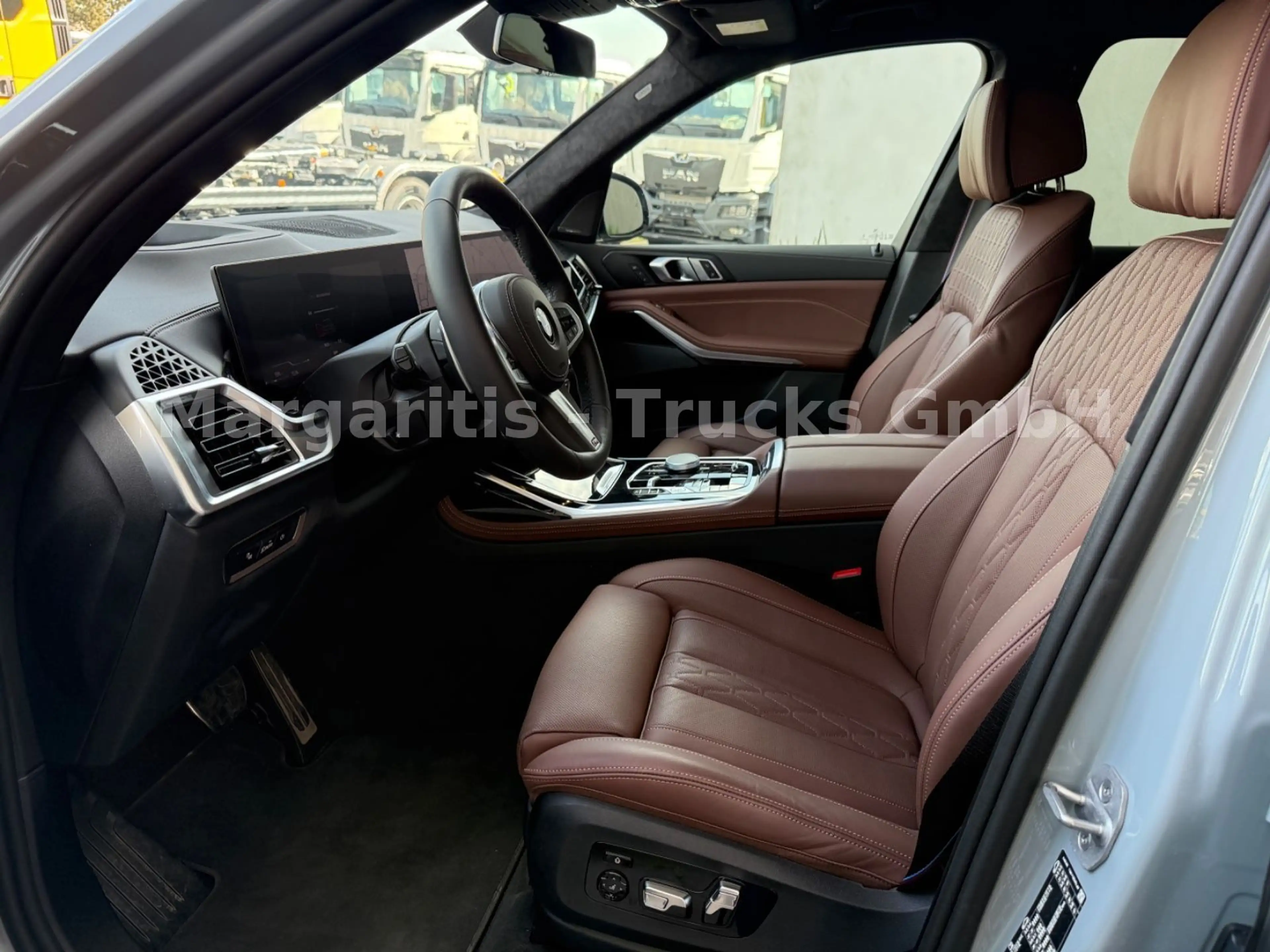 BMW X7 xDrive40d/MPaket/23"/PanoSky/Soft/Integral — photo 6