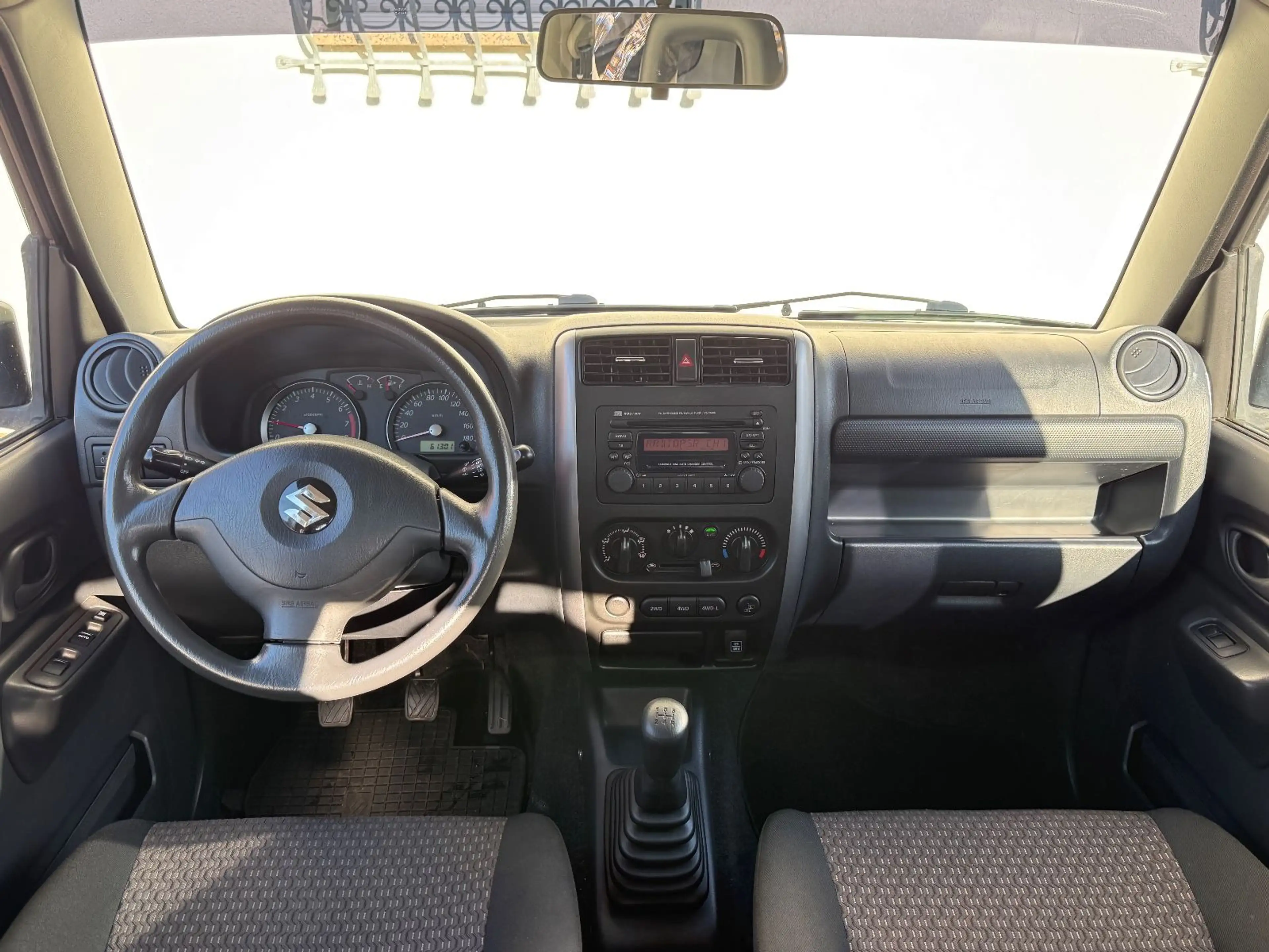 Suzuki Jimny 4x4 ALLRAD Klima TÜV NEU Chrom-Frontbügel — photo 15