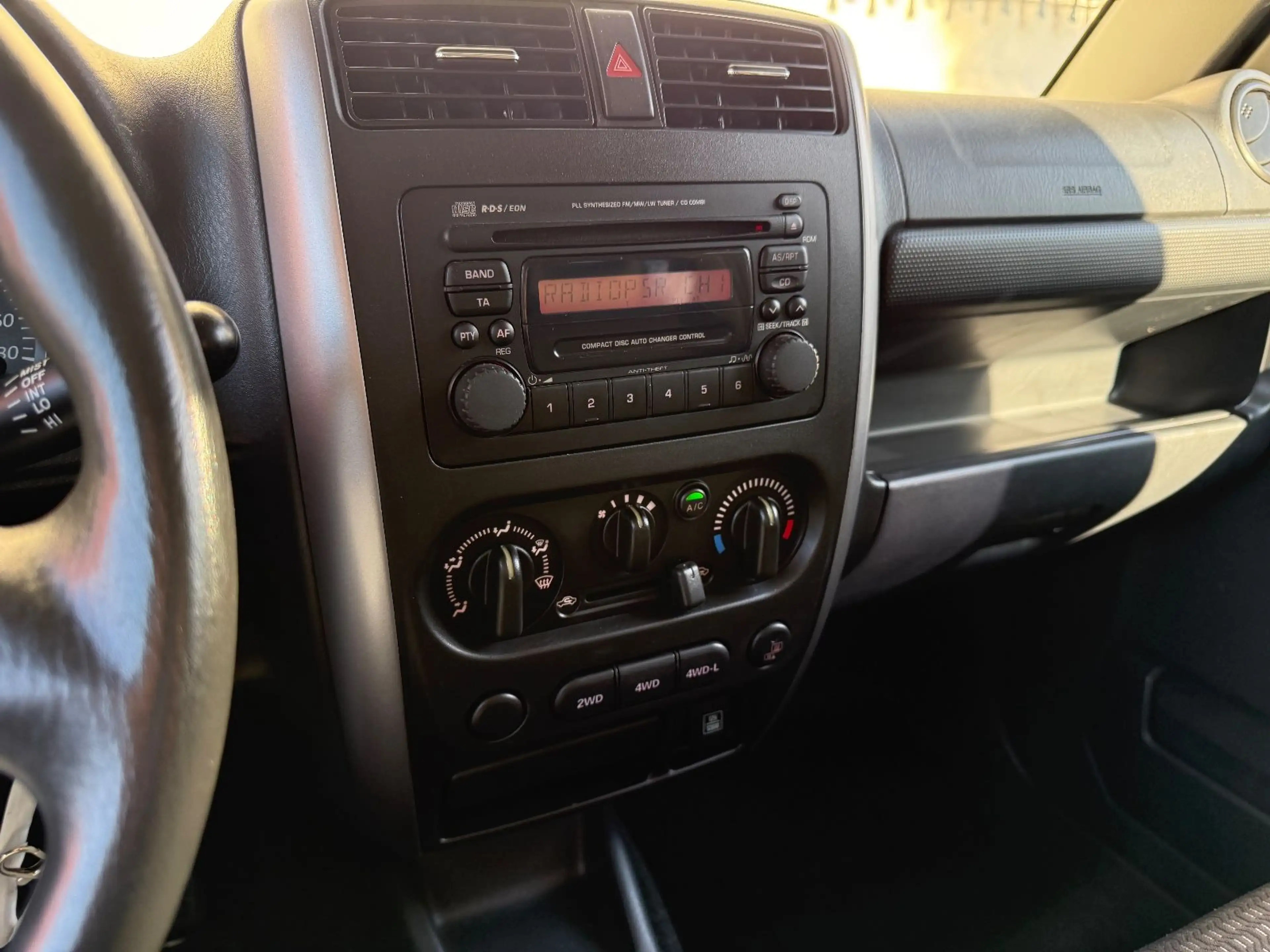 Suzuki Jimny 4x4 ALLRAD Klima TÜV NEU Chrom-Frontbügel — photo 13