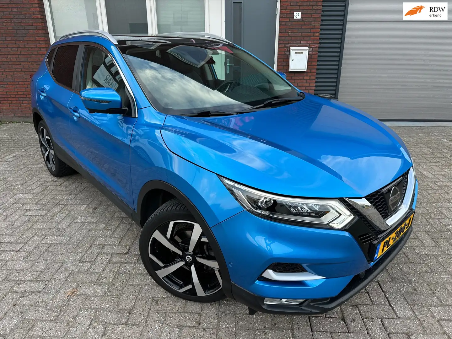 Nissan Qashqai 1.2 Tekna / Pano / Bose / Leder / Camera / PDC / L Blau - 1