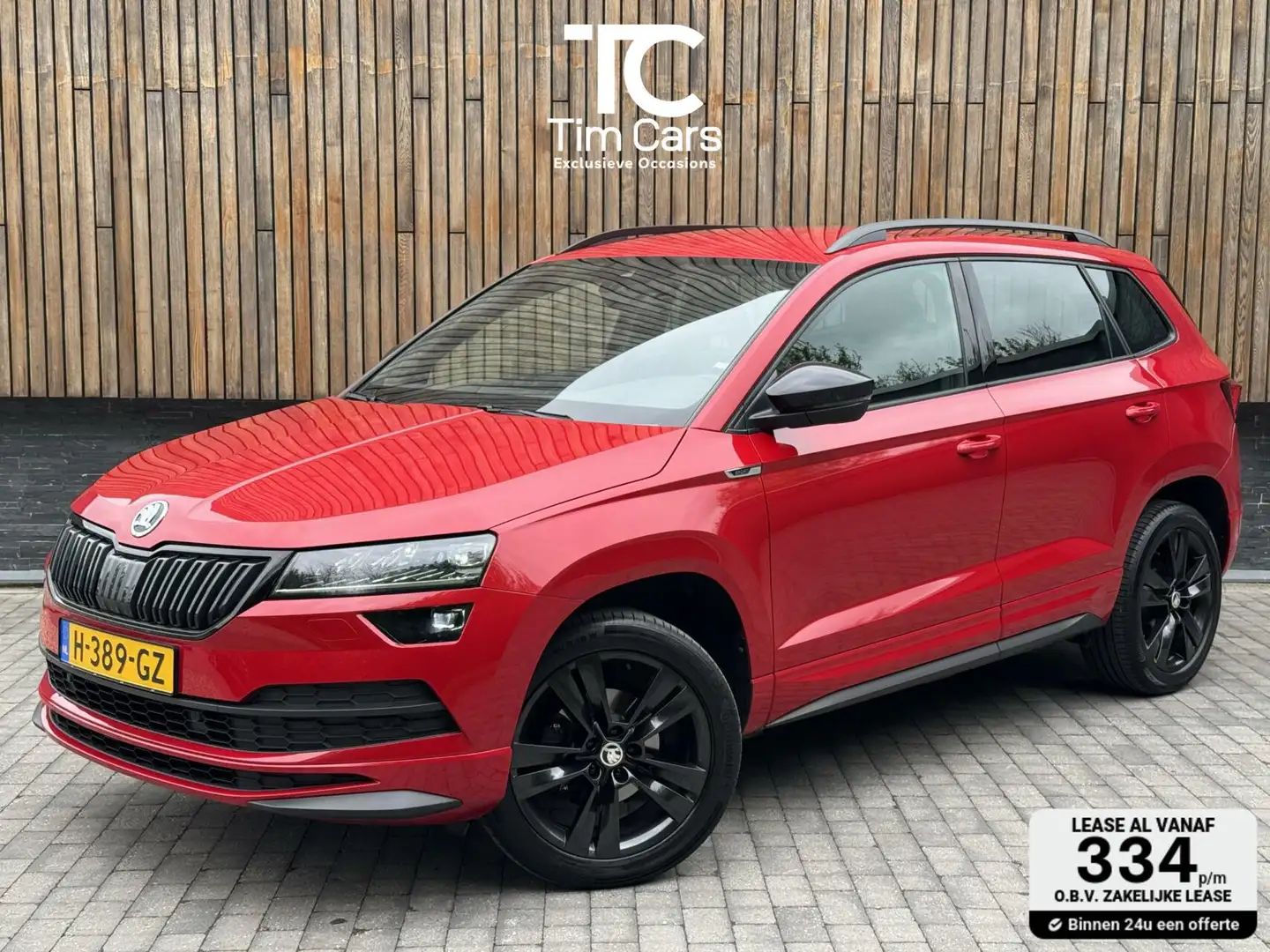 Skoda Karoq 1.5 TSI Sportline Automaat | Stoelverwarming | App Rood - 1