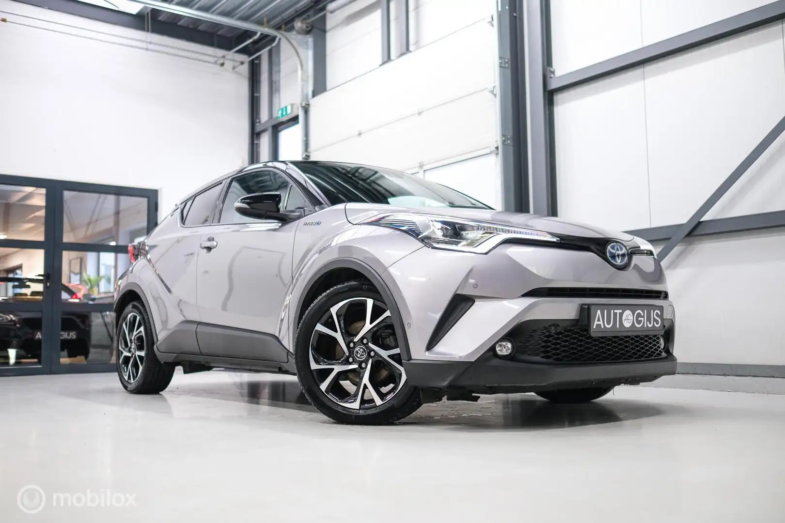 Toyota C-HR 1.8 Hybrid Bi-Tone Plus | Camera | Stoel + stuurwi Gris - 1