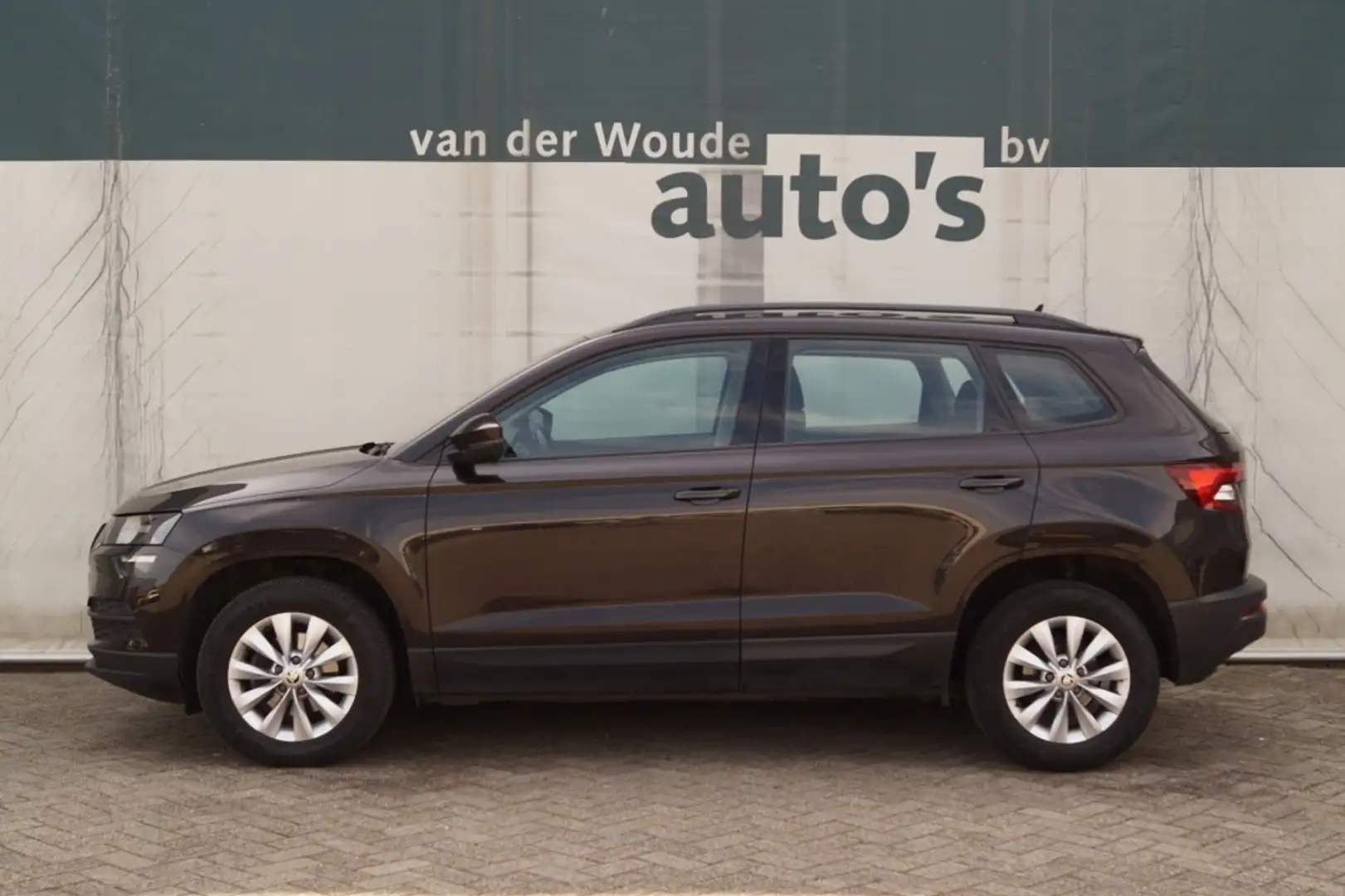 Skoda Karoq 1.5 TSI 150pk DSG Business Edition -NAVI-ECC-PDC- Bruin - 1