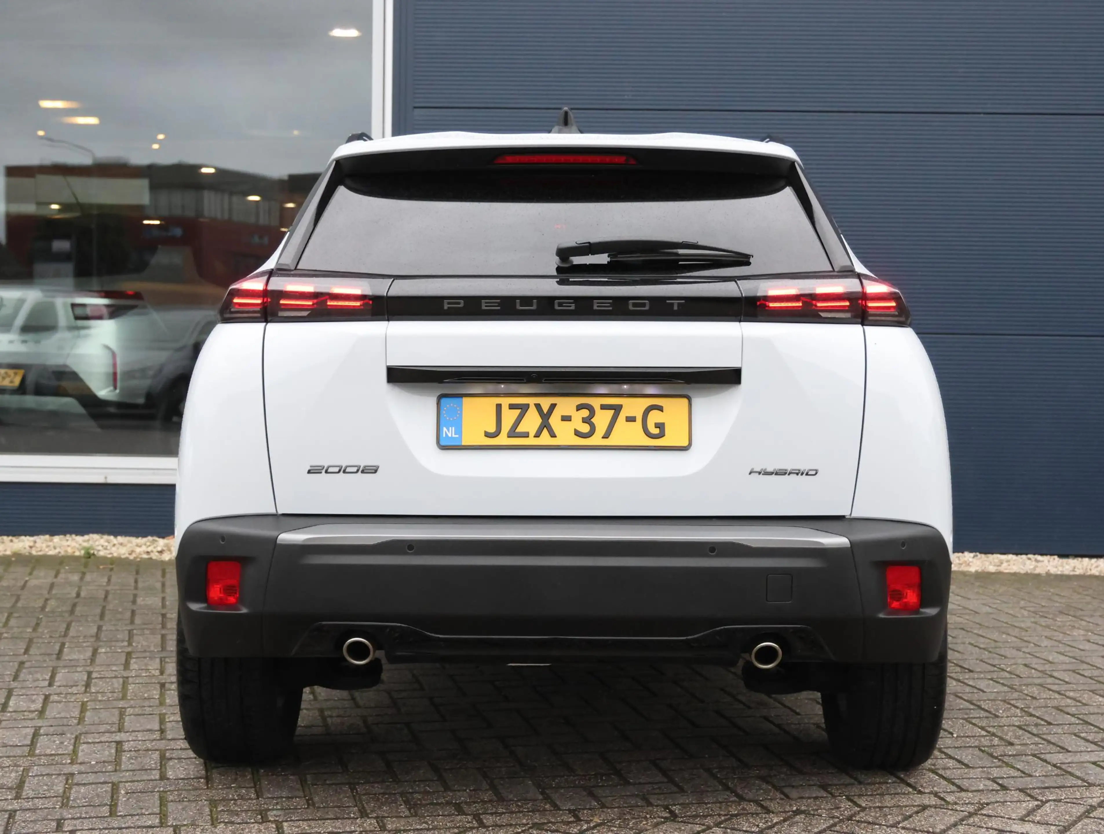 Peugeot 2008 1.2 Hybrid 145 Allure 8 jaar garantie! | Parkeerse — photo 7