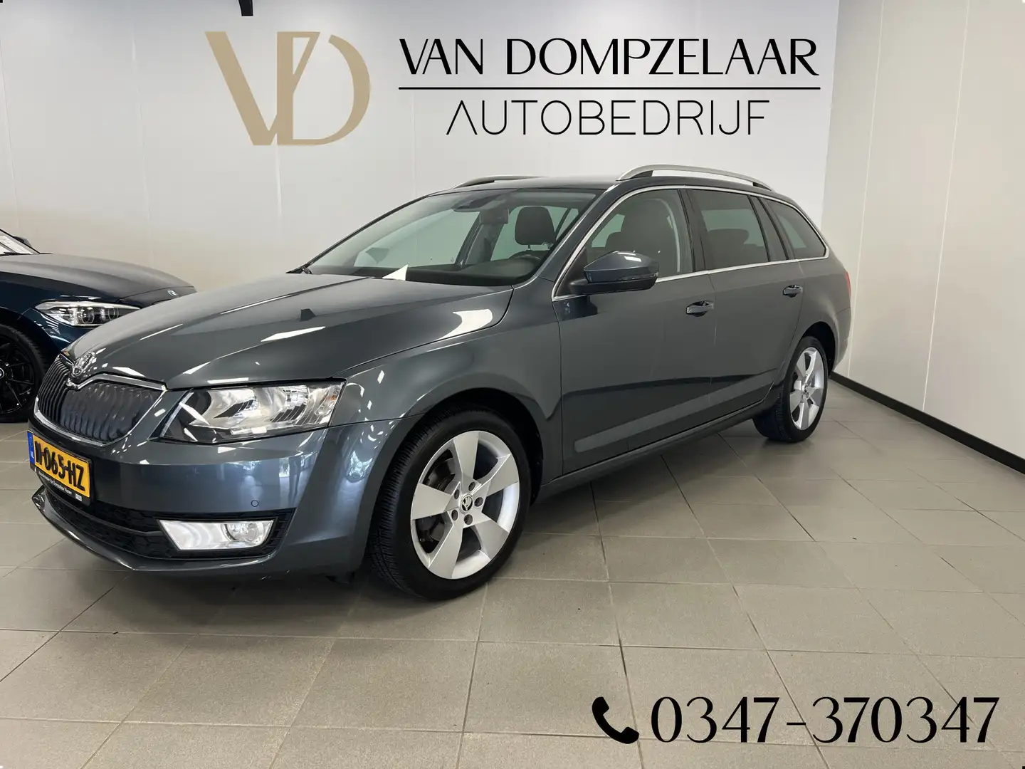Skoda Octavia Combi 1.6 TDI 4X4 Bus.Line / NAVI / STOELVERW. / A Grijs - 1