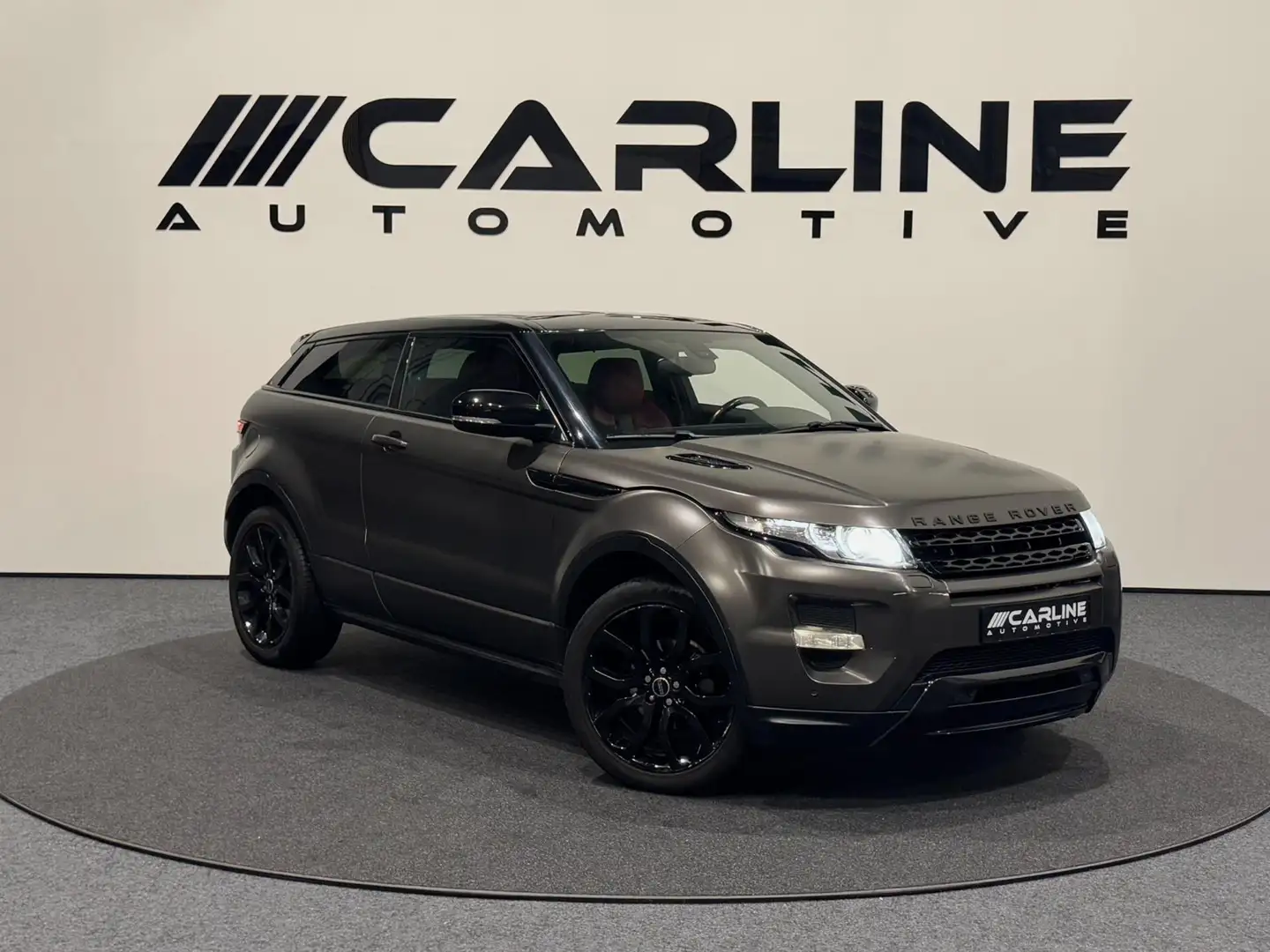 Land Rover Range Rover Evoque Coupé 2.0 Si 4WD Prestige AUT. CAMERA LEDER STOELV Verde - 1