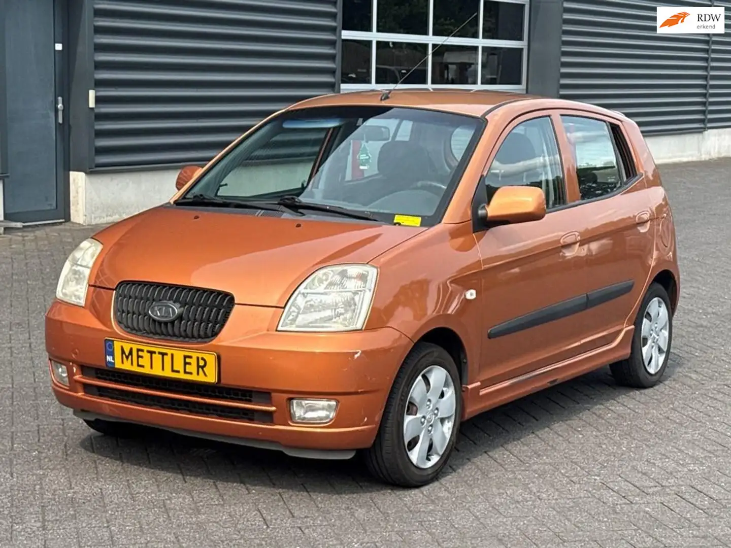 Kia Picanto 1.0 12V Hatchback Benzine 999cc 45kW (61pk) FWD Orange - 1
