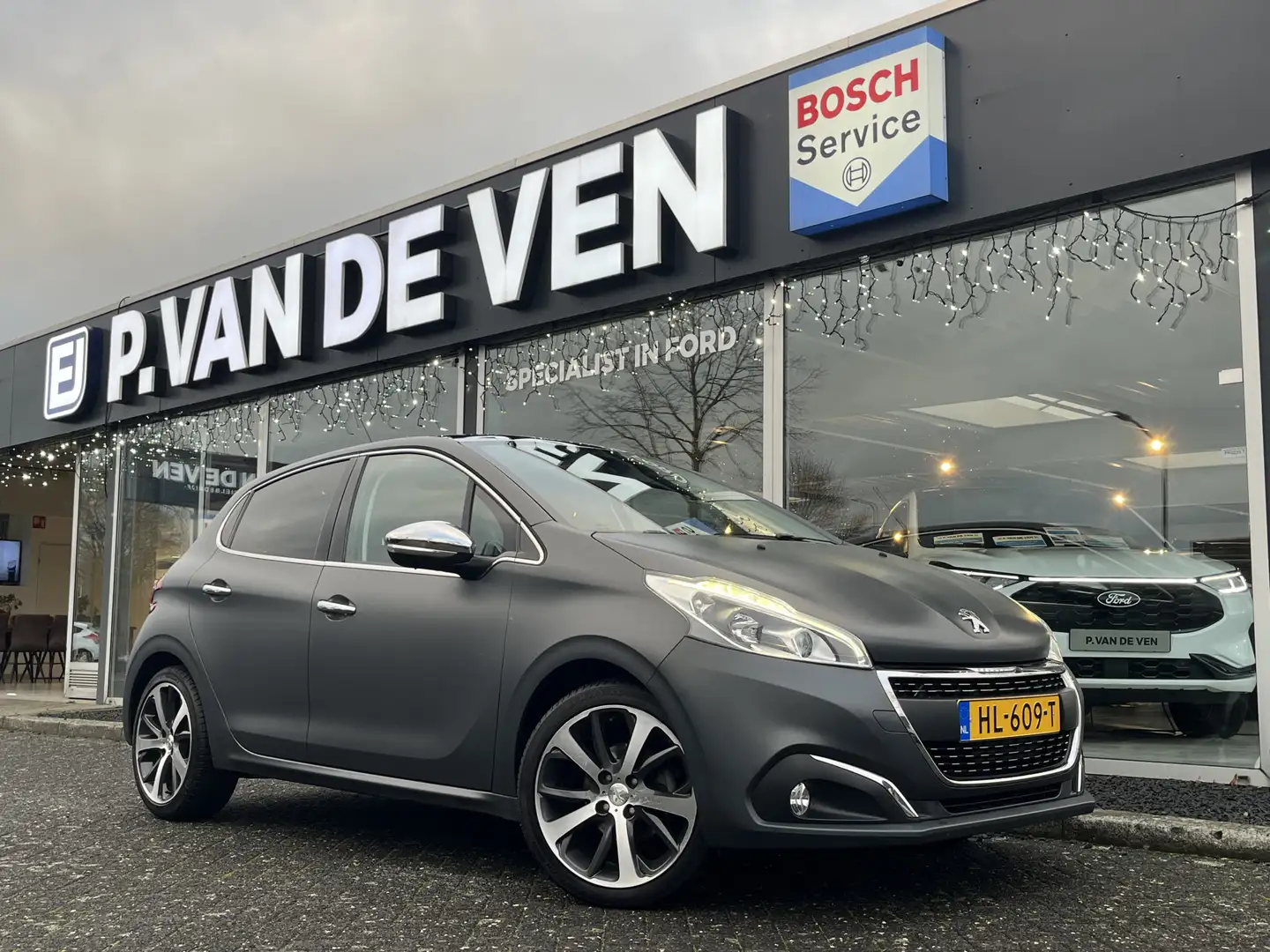 Peugeot 208 1.2 PureTech Première 110pk | Matte lak | Afneemba Grijs - 1