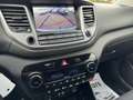 Hyundai TUCSON 2.0 CRDi 4WD / CLIMATISATION / NAVIGATION / JANTES Gris - thumbnail 15