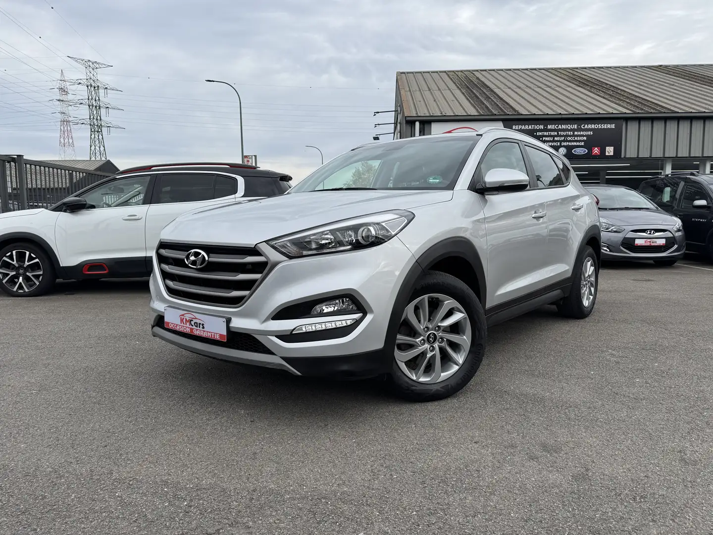 Hyundai TUCSON 2.0 CRDi 4WD / CLIMATISATION / NAVIGATION / JANTES Gris - 1
