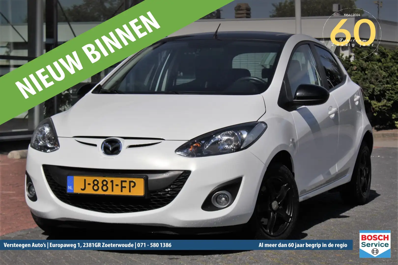 Mazda 2 1.3 84pk 5D GT-Navigator Black & White edition Wit - 1