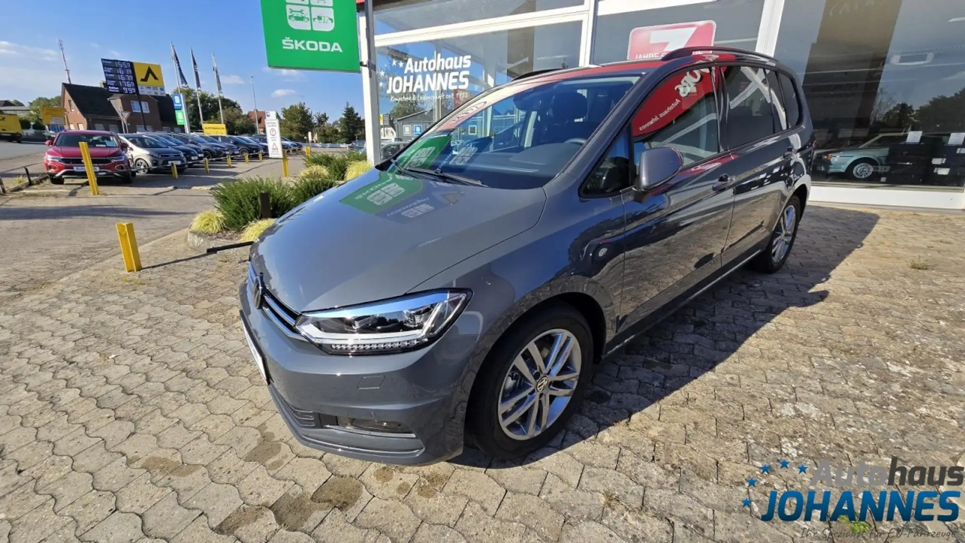 Volkswagen Touran 1.5 TSI Comfortline 7-Sitzer DSG Klima Navi Grau - 1